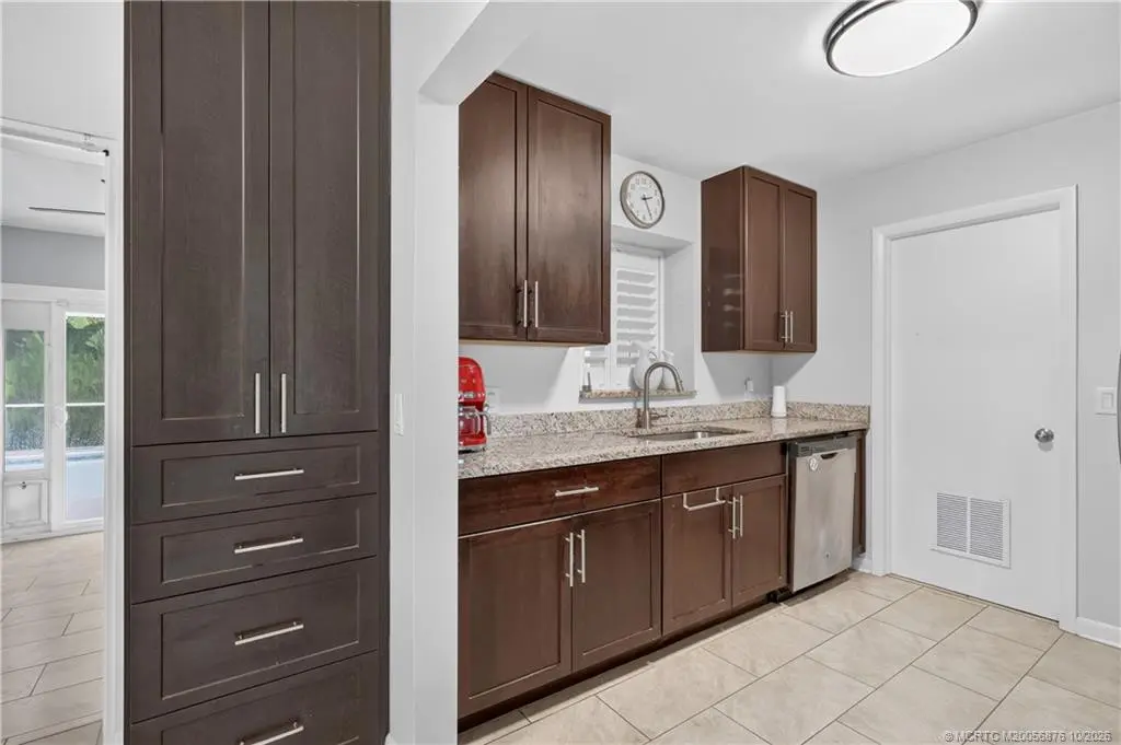 Spacious pantry at 908 SW 36th Terrace, Palm City