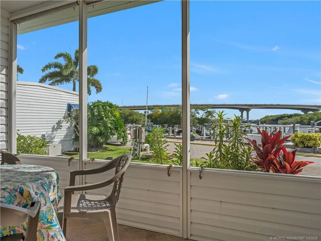 Private Screened Patio with Bridge Views at 3500 S Kanner Highway 137, Stuart