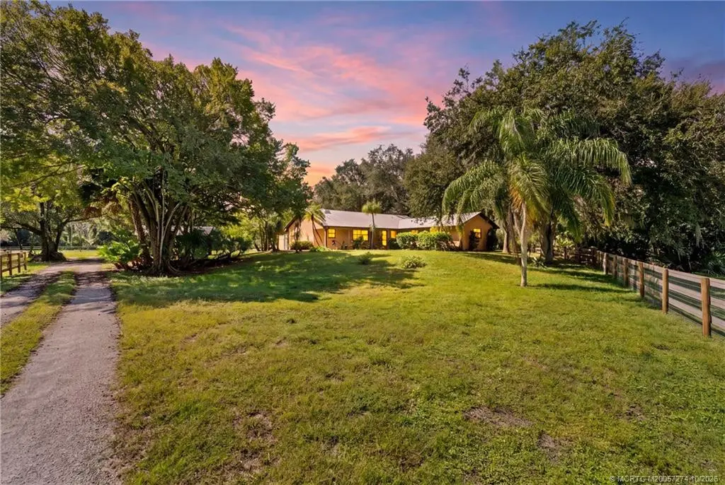 Sunset in Palm City Farms. at 5820 SW Grove Street, Palm City