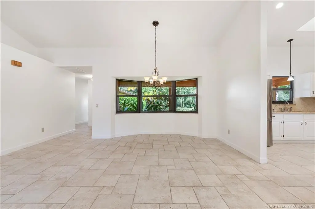 Dining area of great room. at 5820 SW Grove Street, Palm City