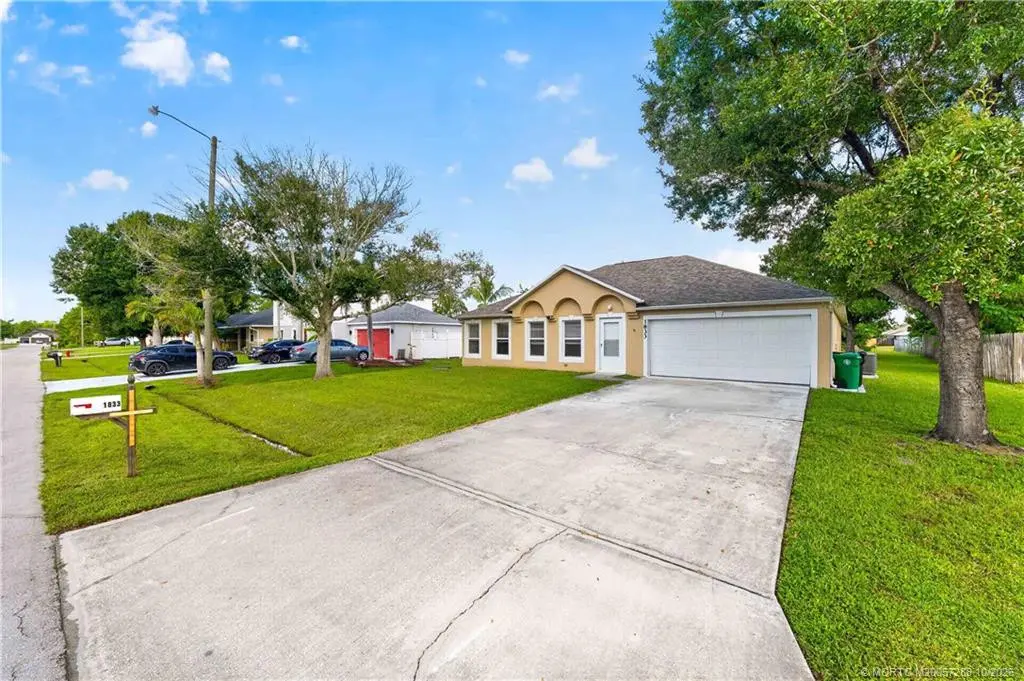 Photo 2 at 1833 SW Lofgren Avenue, Port St. Lucie