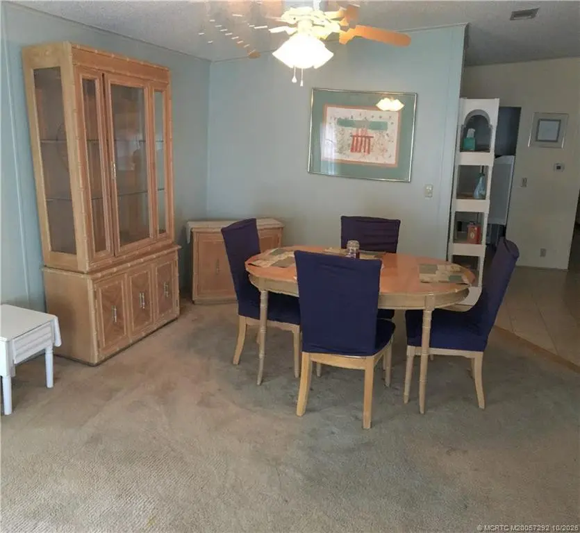 Dining room at 14474 SW Rake Drive K-06, Indiantown