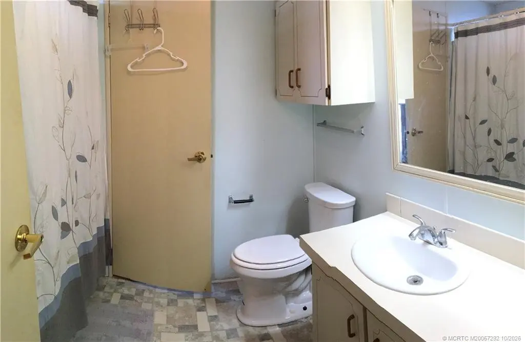 Guest full bath at 14474 SW Rake Drive K-06, Indiantown