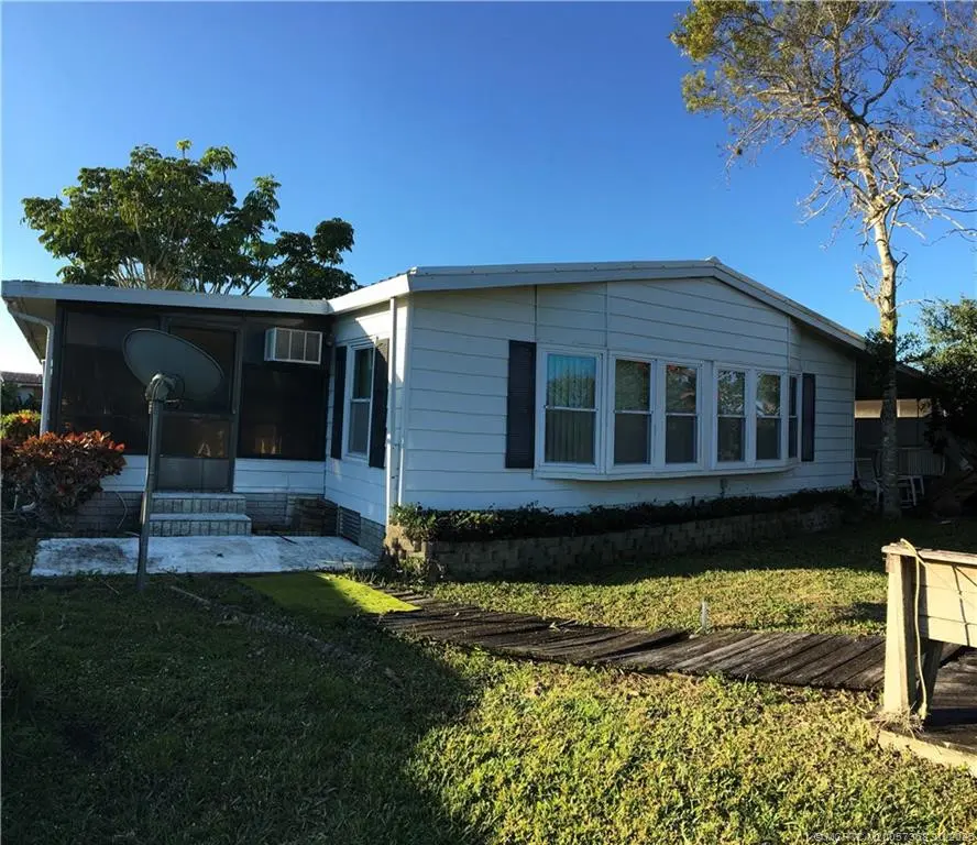 Back of Home at 14301 SW Divot Drive G-33, Indiantown