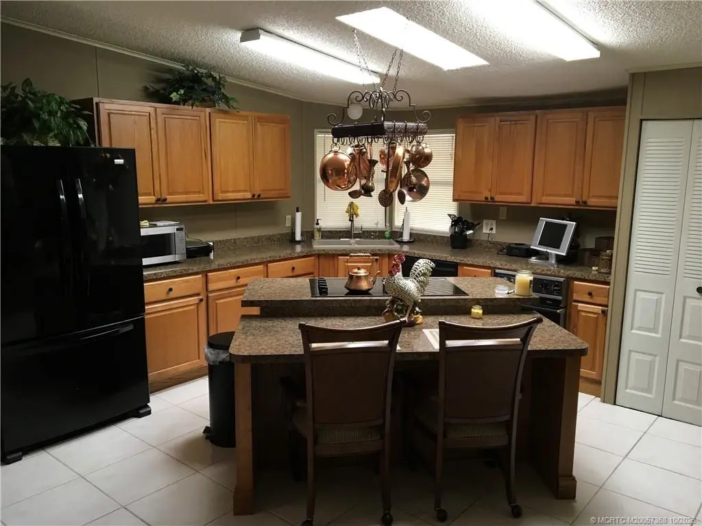 Kitchen at 14301 SW Divot Drive G-33, Indiantown