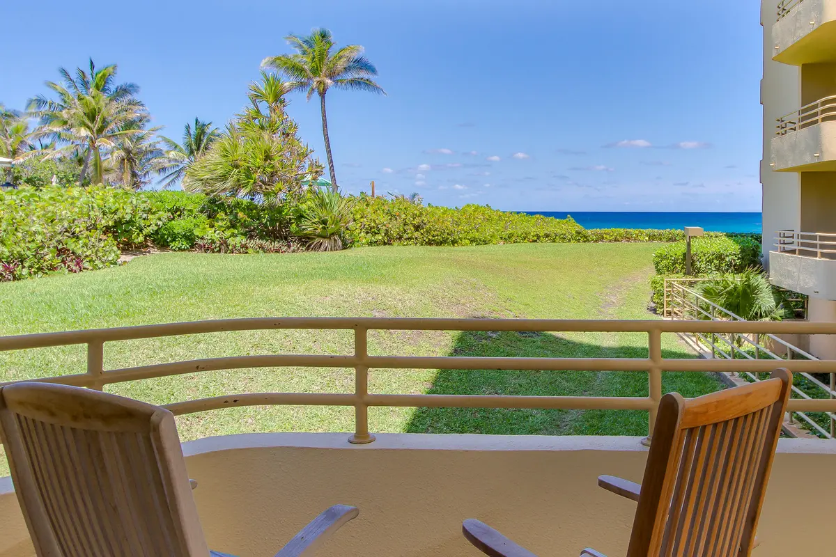 Open grass and ocean views at 3407 S Ocean Boulevard 1-D, Highland Beach