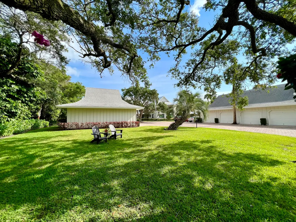 Lush, tropical property at 851 Saturn Street F, Jupiter