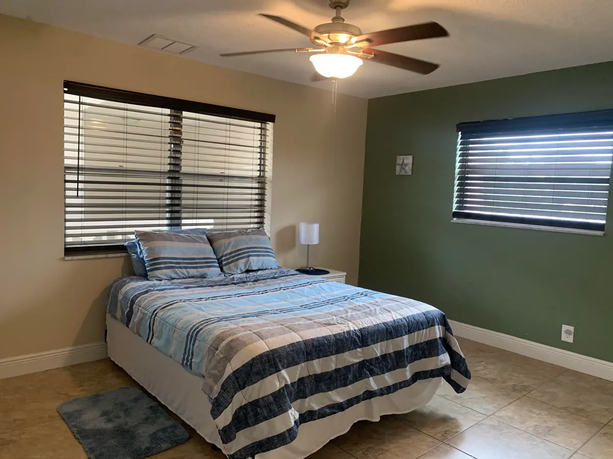8) Main Bed I at 801 Hummingbird Way 201, North Palm Beach