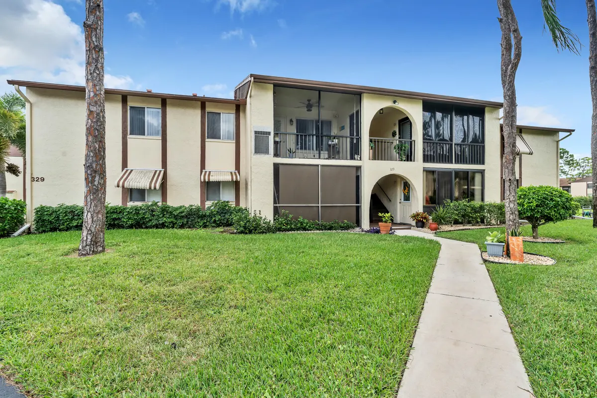 front of building at 329 Knotty Pine Circle A-2, Greenacres