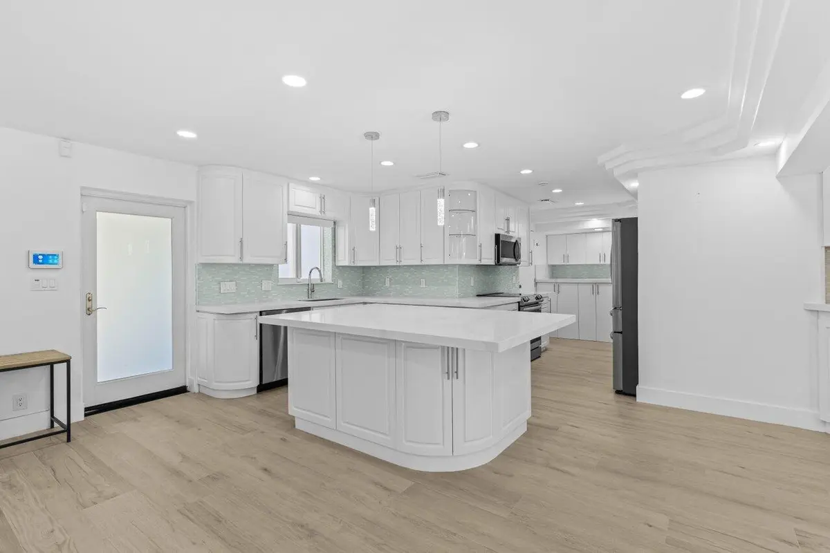 front door & kitchen view at 2611 NE 49 Street, Lighthouse Point