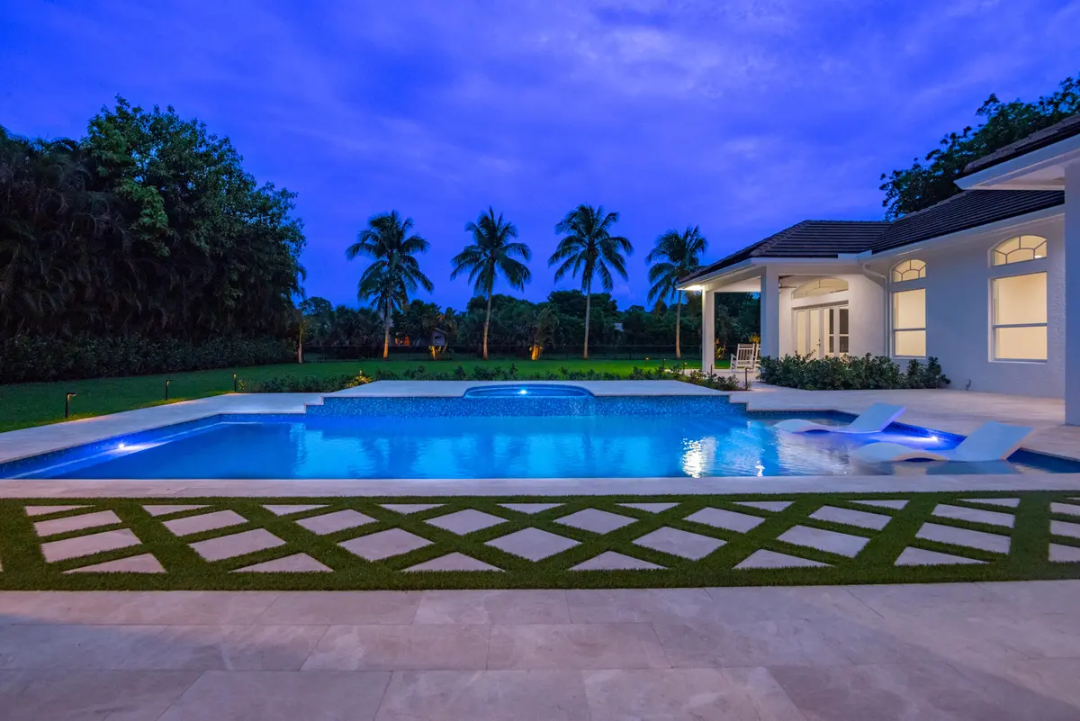 Pool at Twilight at 8246 Man O War Road, Palm Beach Gardens