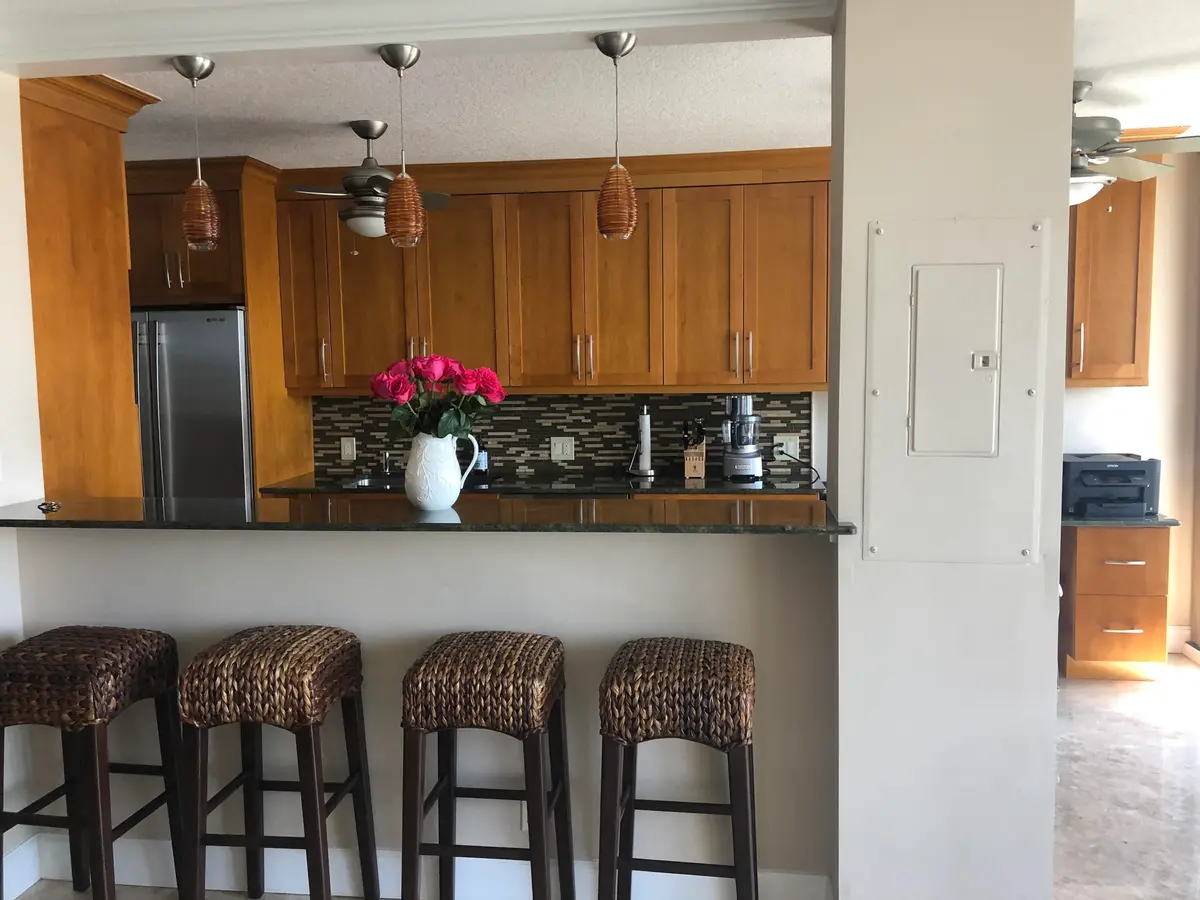 Opening Between Living Room & Kitchen at 3400 N Ocean Drive 1506, Riviera Beach