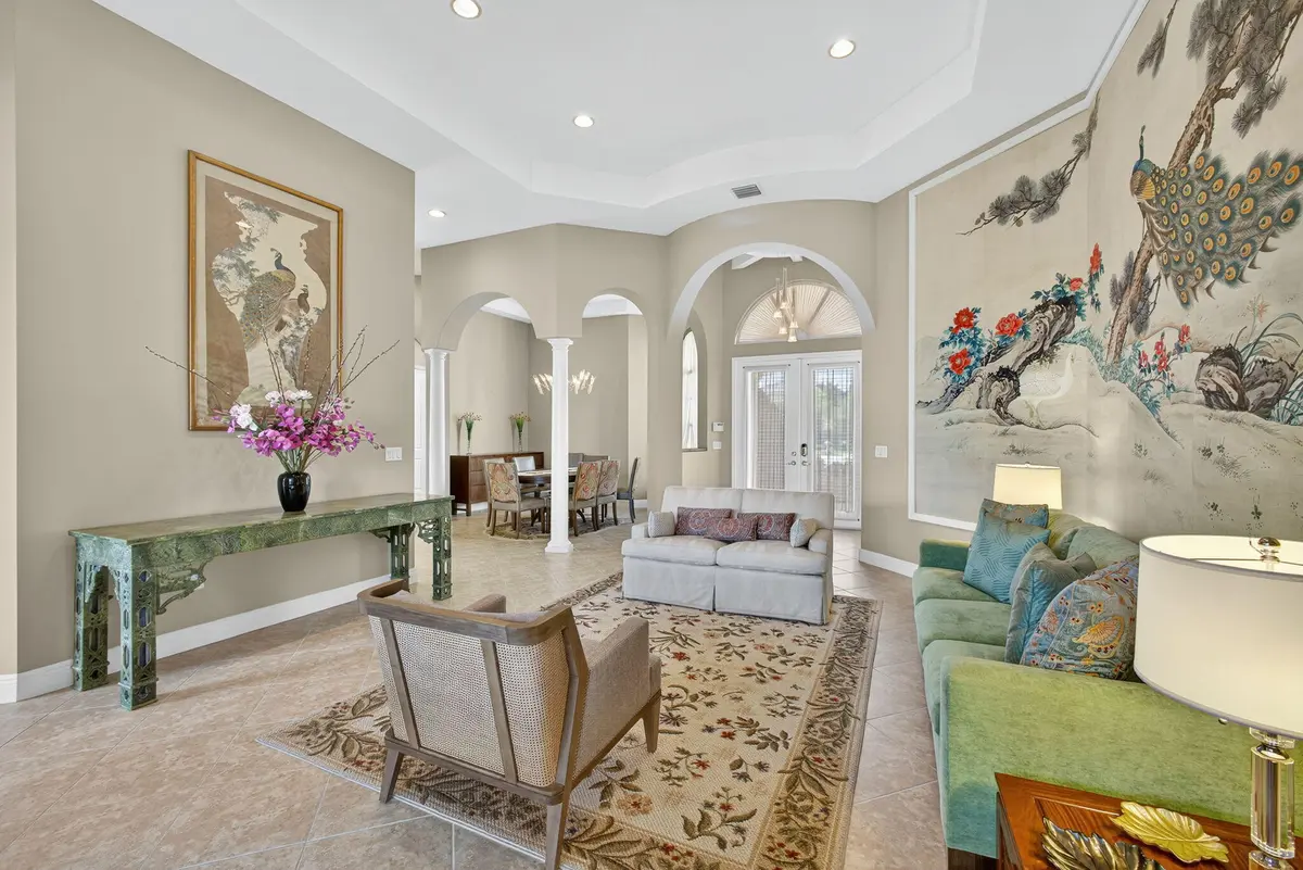 LIVING ROOM TO FRONT ENTRY at 9783 Via Grandezza, Wellington