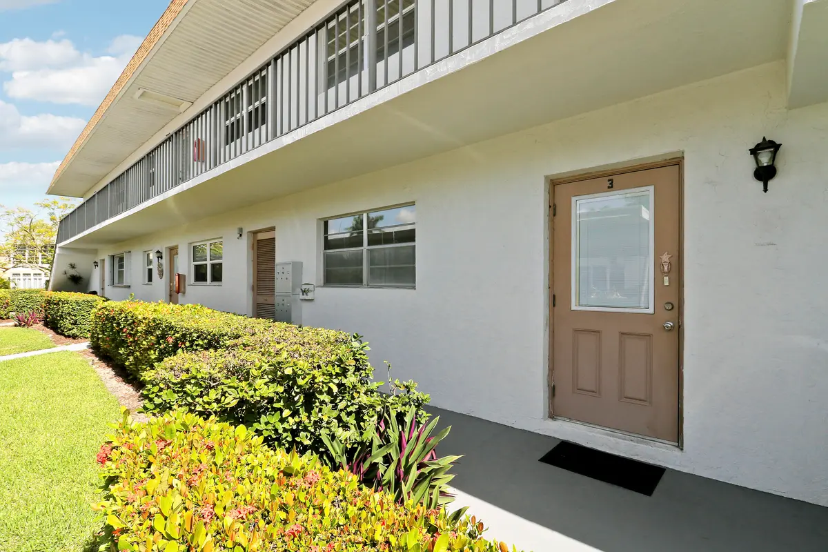 Kingswood Front door at 2950 SE Ocean Boulevard 6-3, Stuart