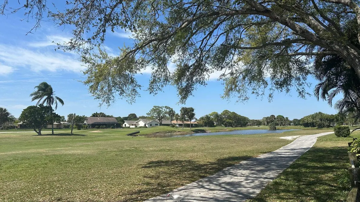 lake view at 7874 SE Saratoga Drive, Hobe Sound