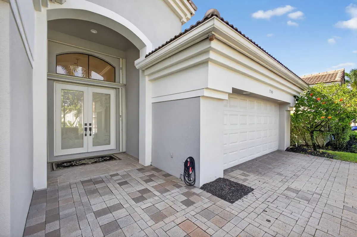 Front of home at 7740 Blue Heron Way, West Palm Beach