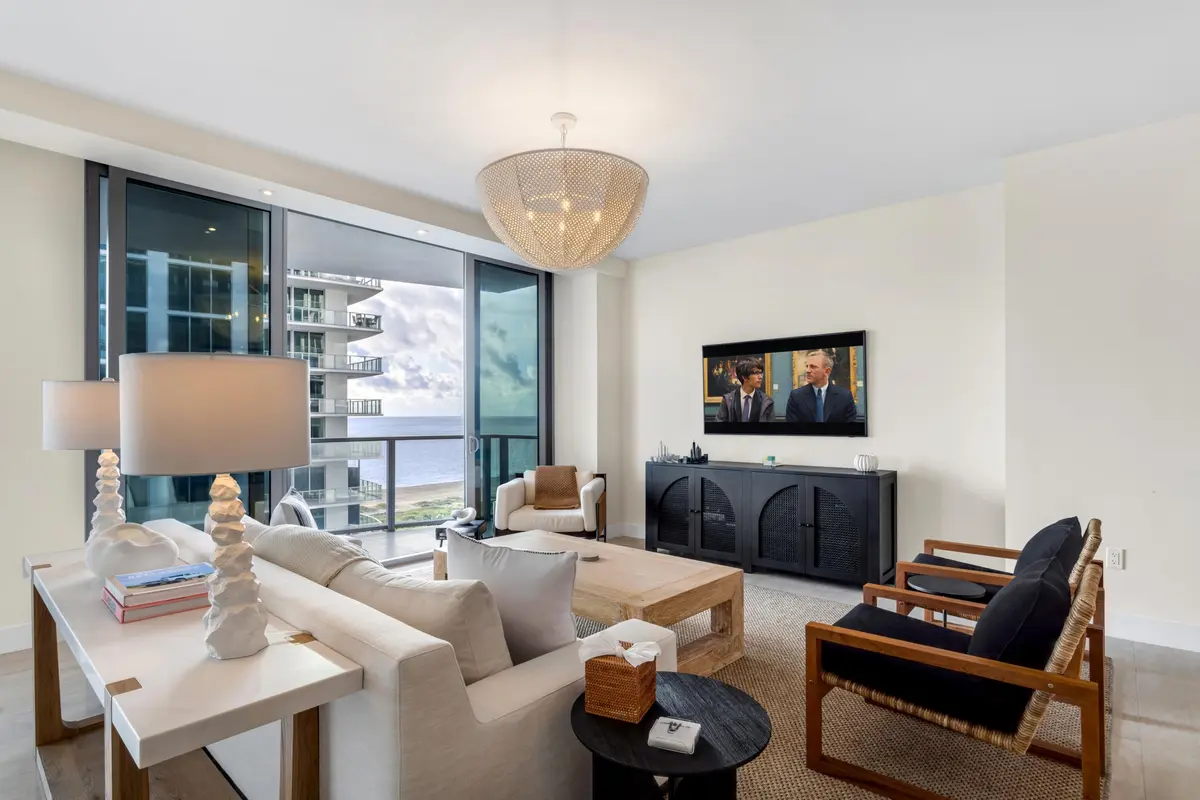 mls_FAMILY_LOOKING_OUT_ANGLE_EB at 3100 N Ocean Drive 1102 P, Singer Island