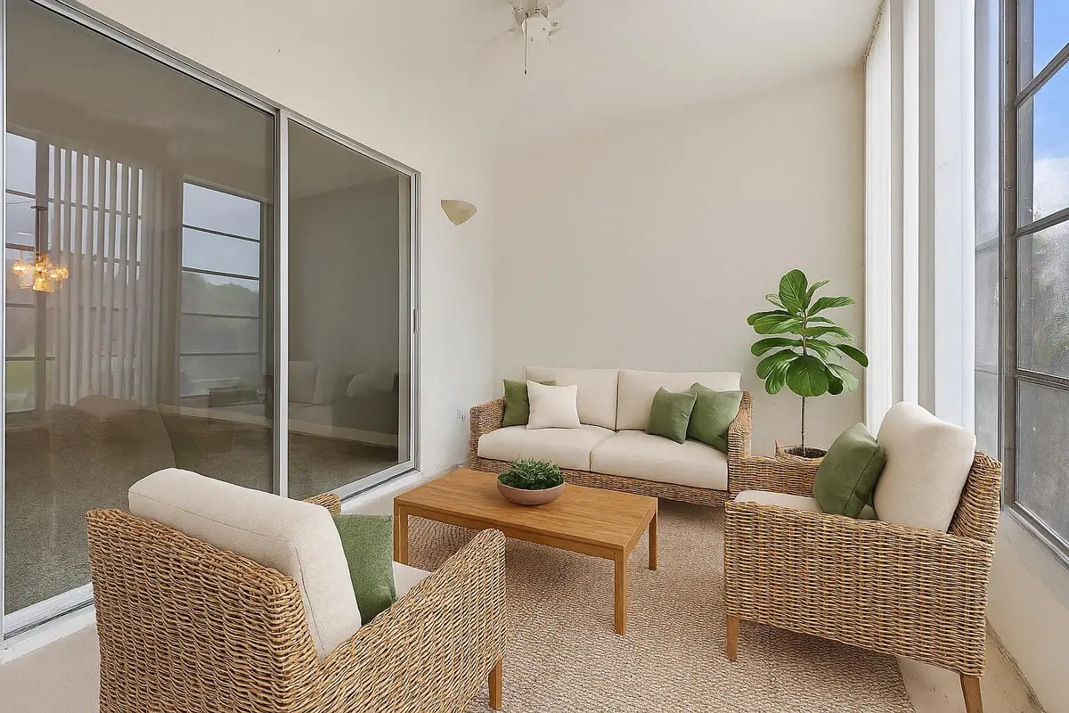 Virtually Staged Florida Room at 230 NE 26th Avenue 206, Boynton Beach