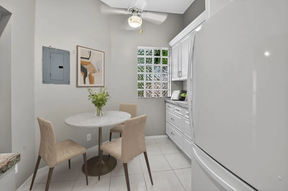 Virtually Staged Eat-In Kitchen at 5414 Venetia Court G, Boynton Beach