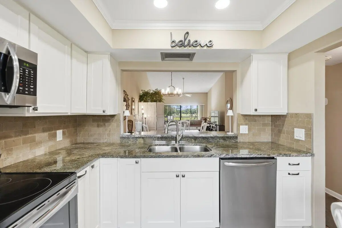Kitchen at 9430 Meadowood Drive 205, Fort Pierce