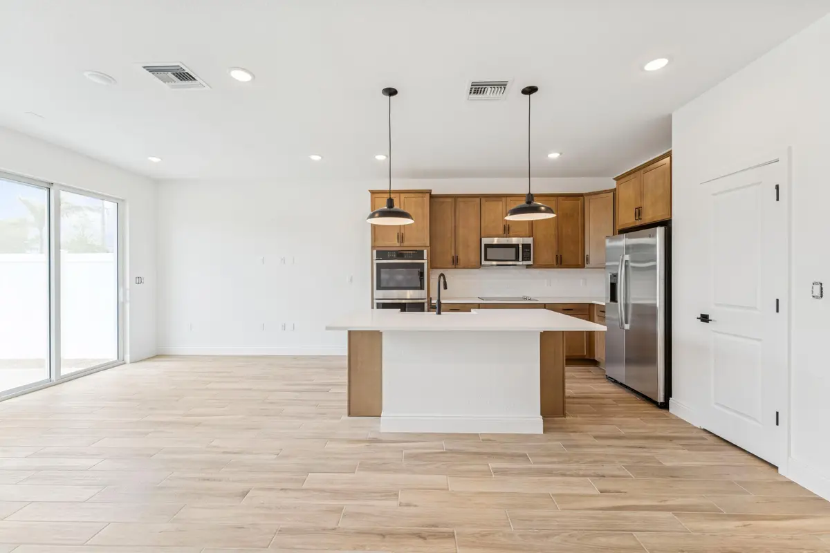 Dining Area, Great Room & Kitchen at 177 SE Birch Terrace 0737, Stuart
