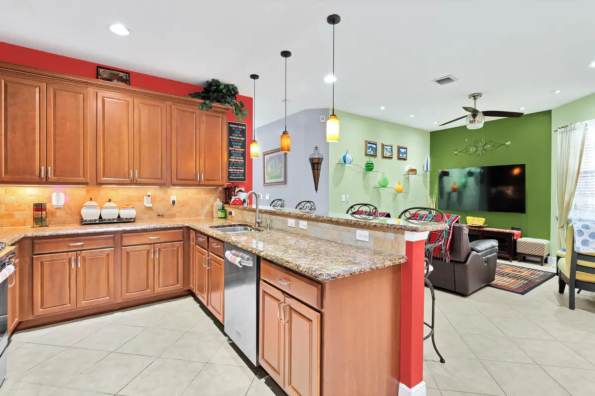 Kitchen towards Family sitting area at 6360 Oxford Circle 101, Vero Beach