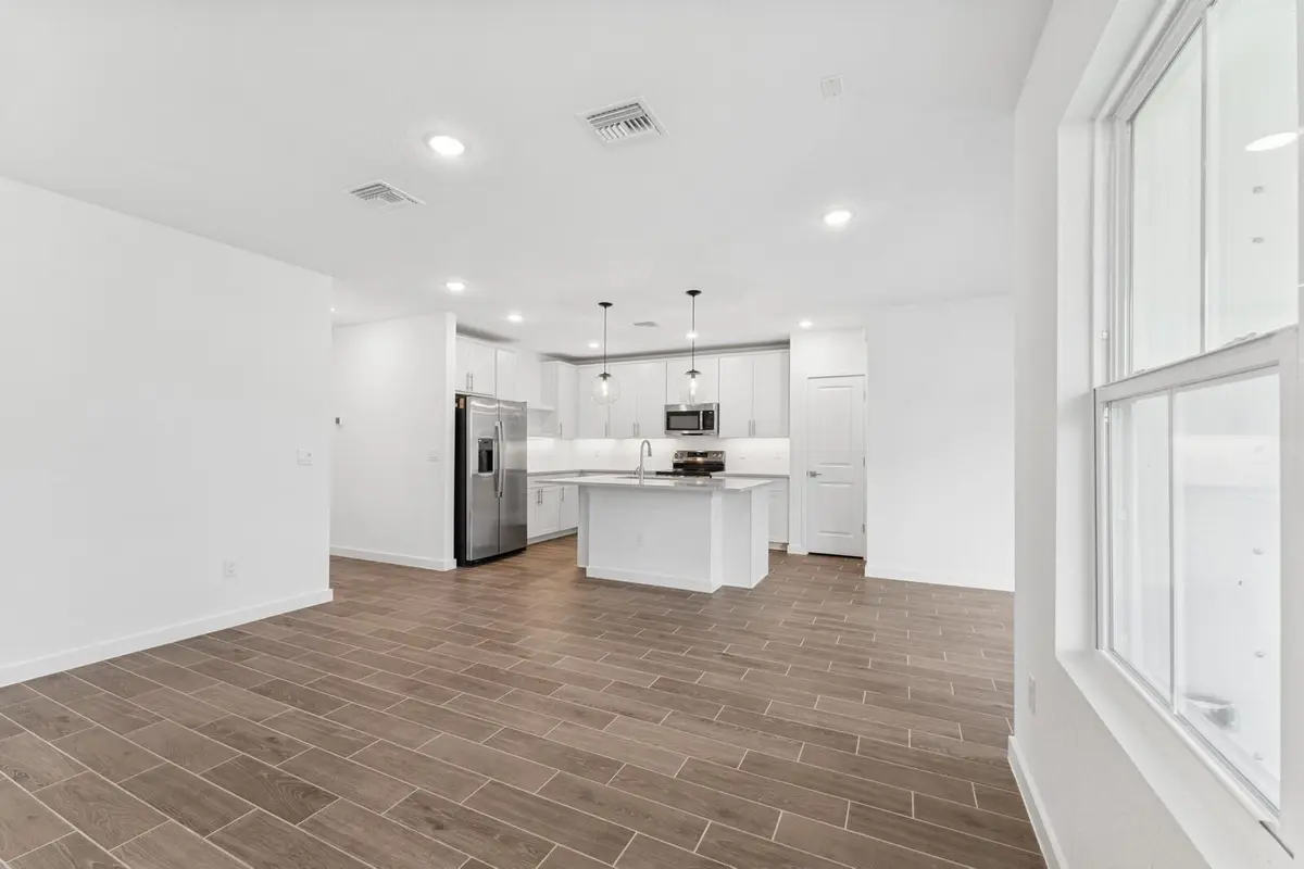 Dining Area Toward Kitchen at 9740 Apollo Avenue 2, Fort Pierce