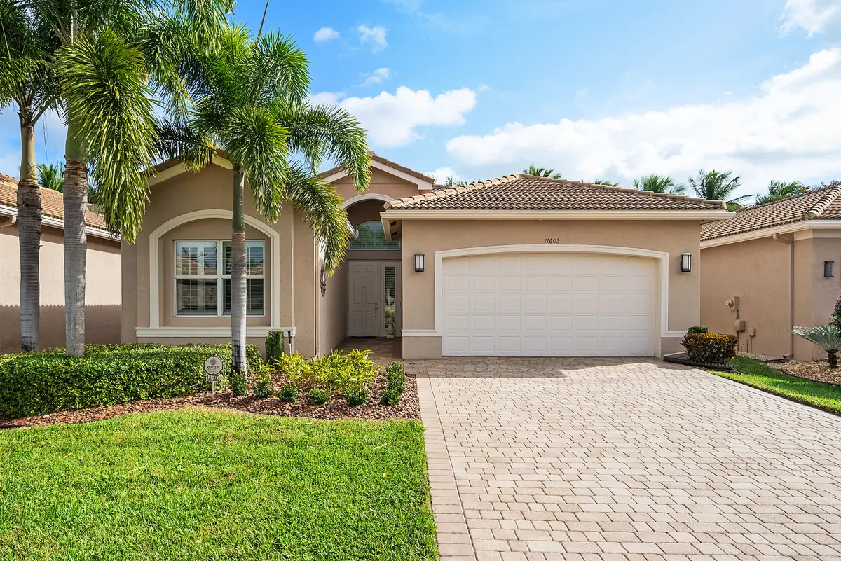 Lushly Landscaped Exerior at 11603 Dawson Range Road, Boynton Beach