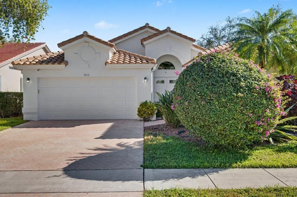 Front Exterior Close at 9879 Harbour Lake Circle, Boynton Beach