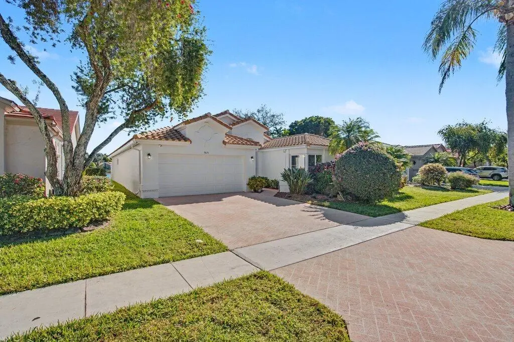 Front Exterior L at 9879 Harbour Lake Circle, Boynton Beach