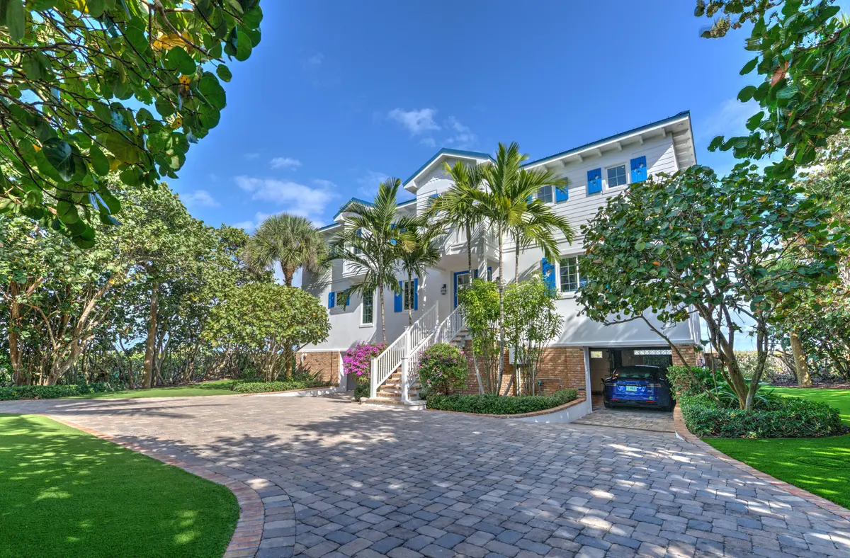 02 Ext Front - Garage Open at 113 N Beach Road, Jupiter Island