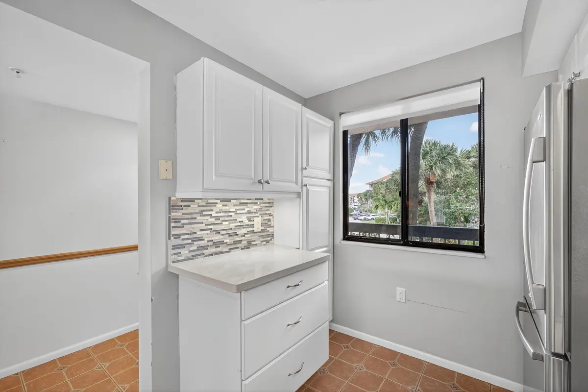 Additional cabinet/pantry area at 2201 Marina Isle Way 202, Jupiter