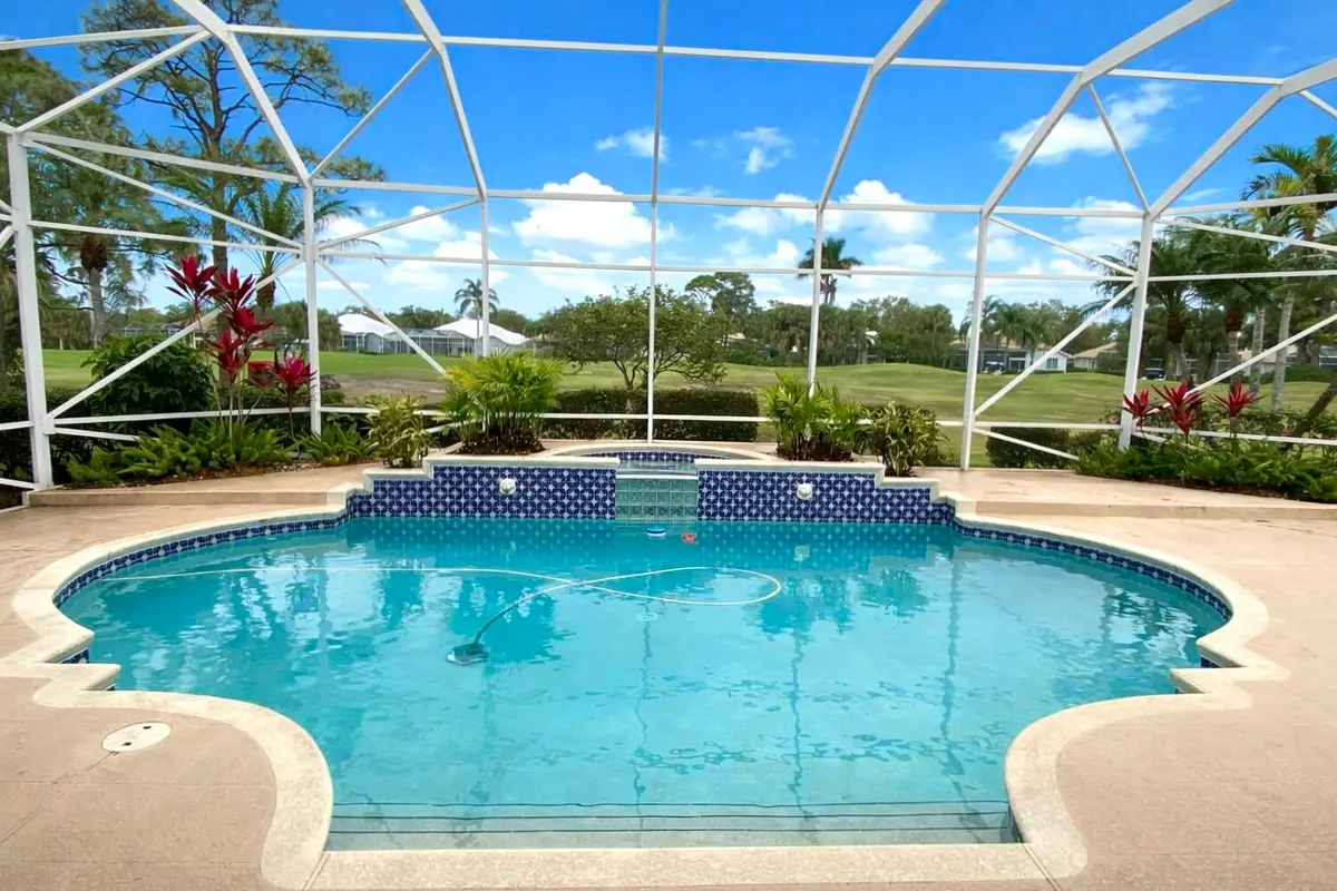 Pool & Spa to the 9th Fairway at 2201 SW Bradford Place, Palm City
