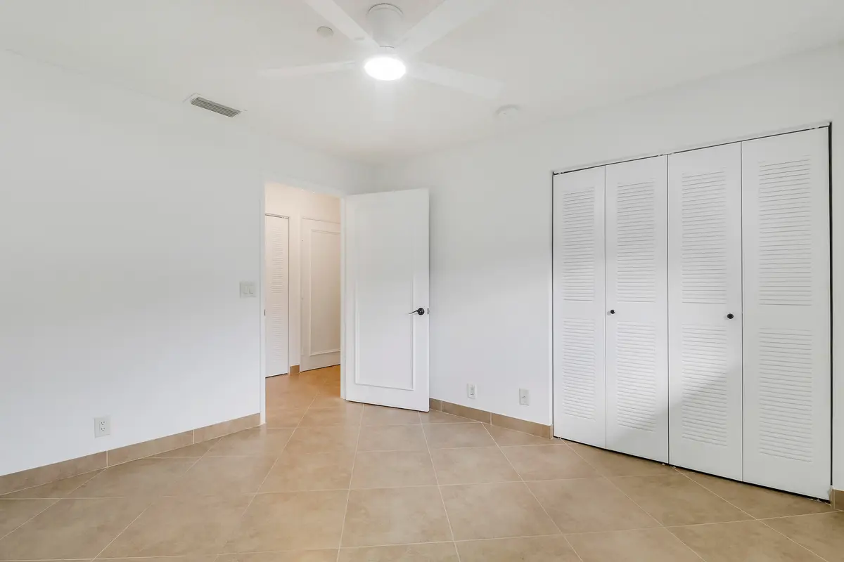Guest bedroom at 15364 Lakes Of Delray Boulevard 61, Delray Beach