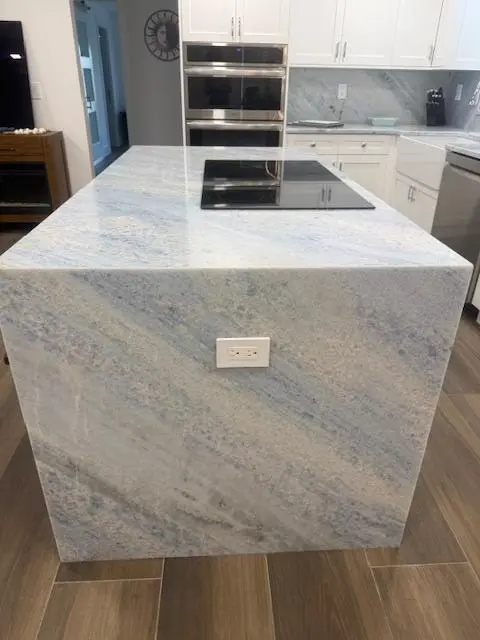 waterfall kitchen island at 5520 N Ocean Boulevard 111, Ocean Ridge