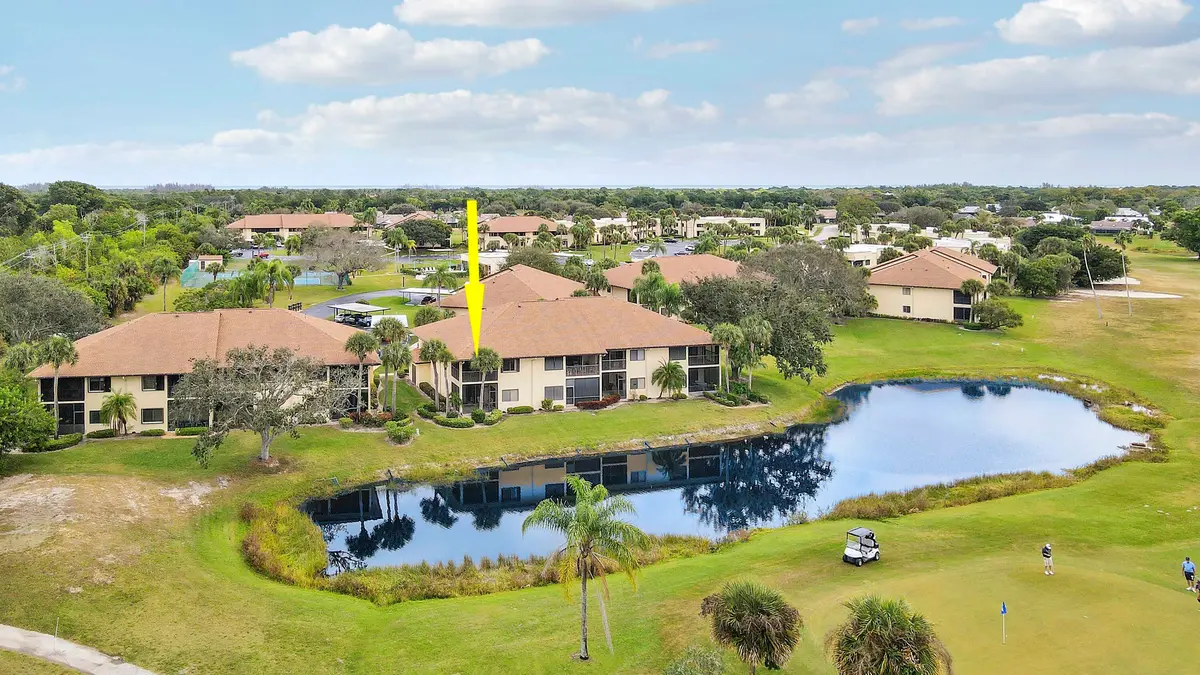 Williamsburg 204 Aerial Lake and golf vi at 6333 SE Williamsburg Drive 204, Hobe Sound