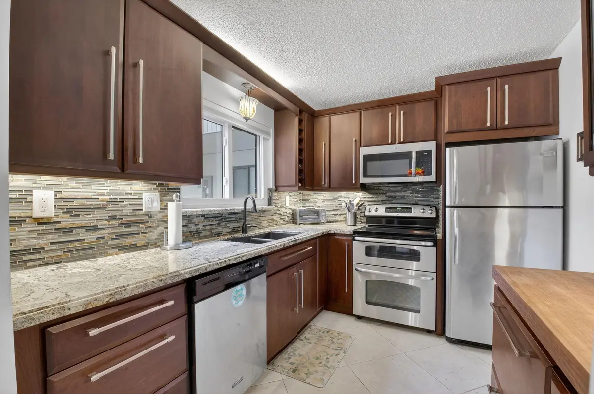 Kitchen Photo Main at 15090 Ashland Place 173, Delray Beach