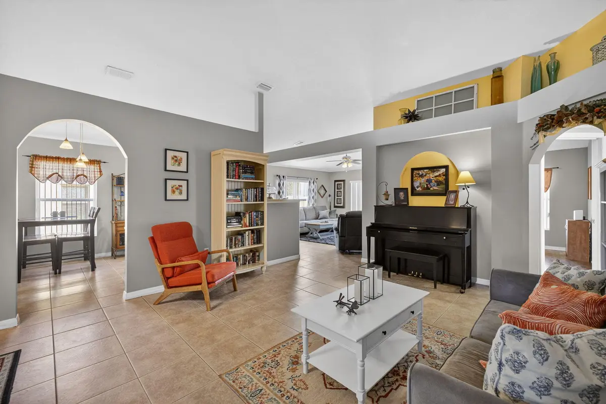 Living room at 6141 NW Wild Cotton Way, Port St. Lucie
