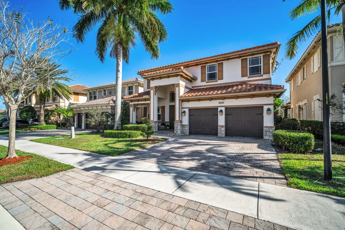 Front Exterior - Driveway View at 8620 Waterside Court, Parkland