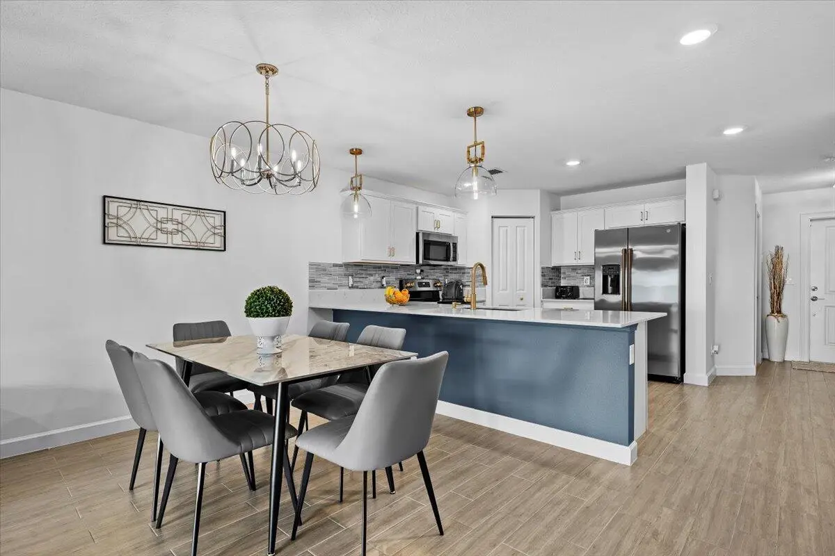 Open Kitchen to Dining - Living at 6013 Woods Edge Circle, Riviera Beach