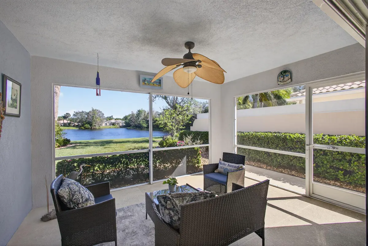 Gorgeous long lake unobstructed view at 8557 SE Retreat Drive, Hobe Sound
