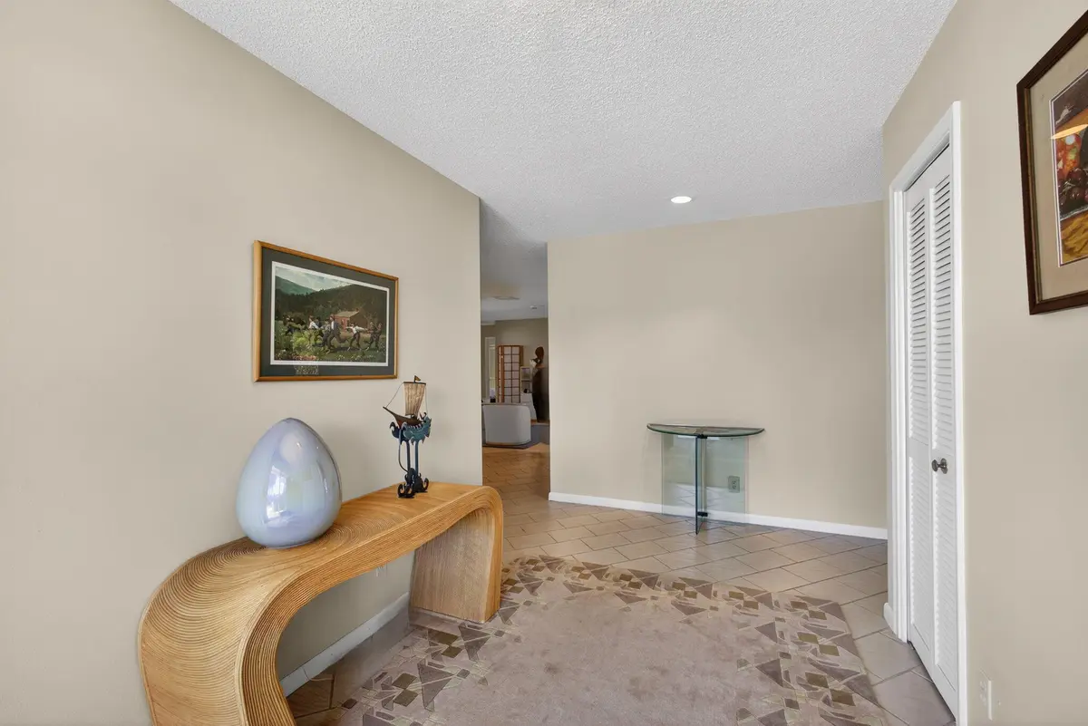 Foyer w closet at 13706 Cross Pointe Drive, Palm Beach Gardens