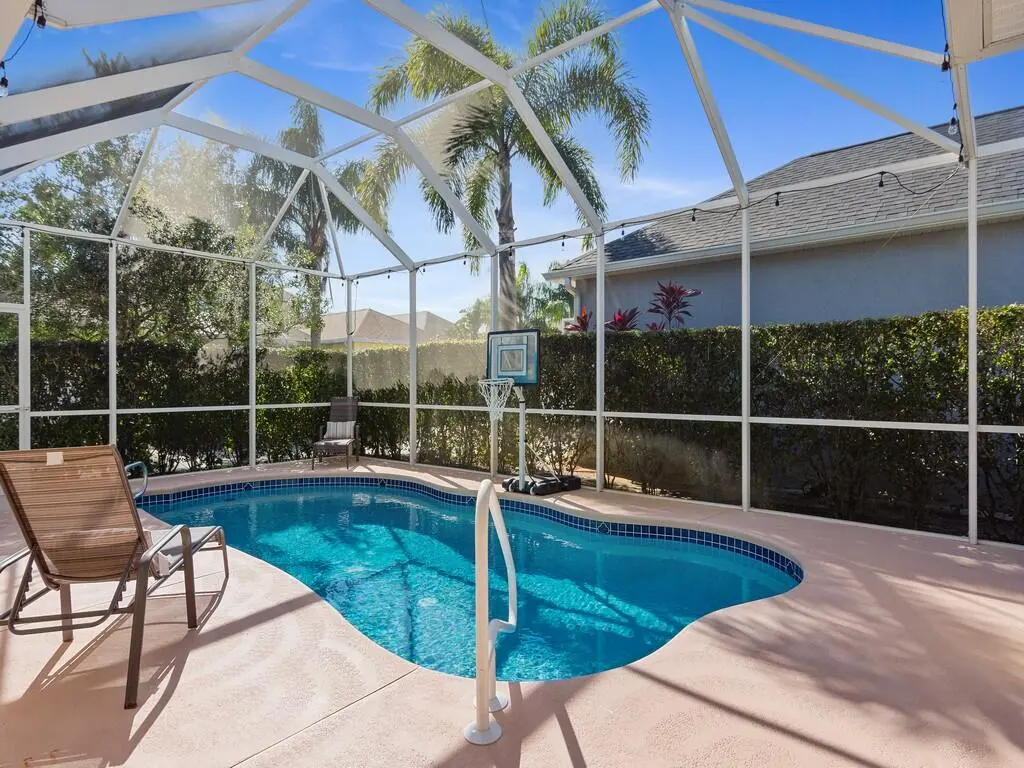 HEATED AND SCREENED POOL at 7543 15th Street, Vero Beach