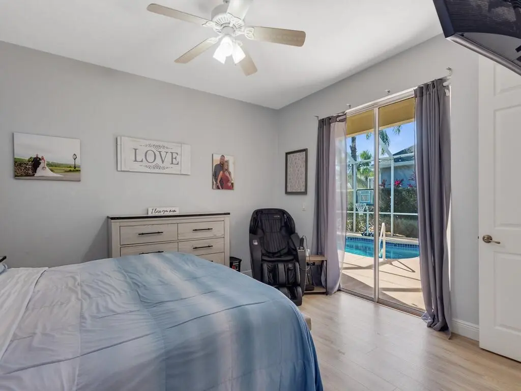 OWNERS BEDROOM VIEW TO POOL at 7543 15th Street, Vero Beach