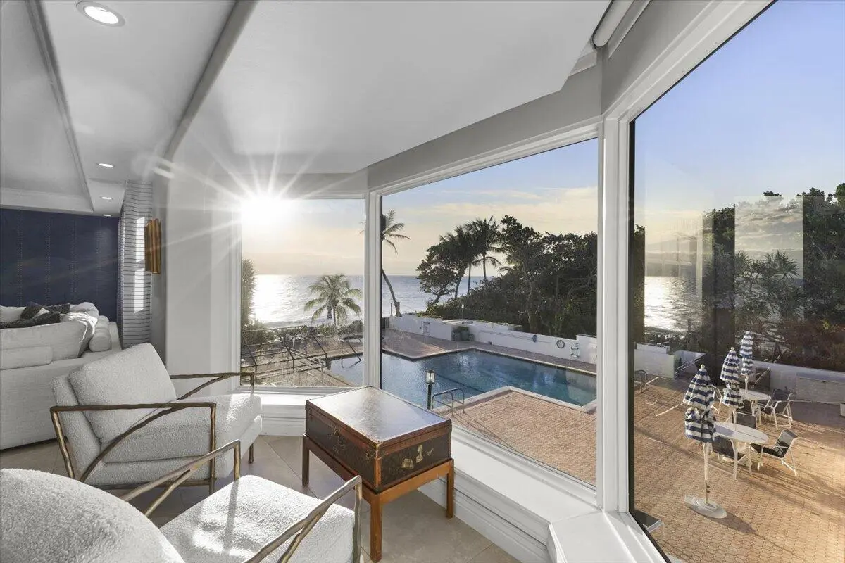 Upper level oceanfront living room at 4605 S Ocean Boulevard 3b, Highland Beach