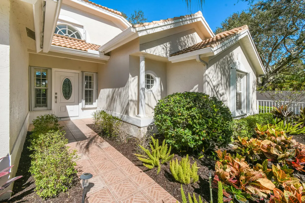 Walkway to front door at 163 Spoonbill Court, Jupiter