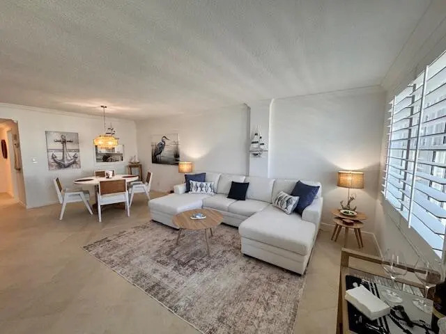 Living - Dining Area + at 3475 S Ocean Boulevard 6110, Palm Beach