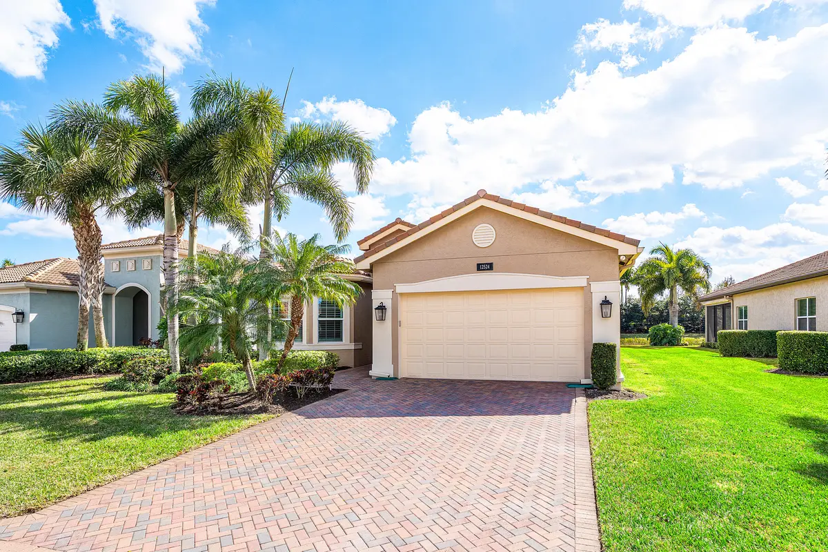 Lushly Landscaped Exerior at 12524 Bonnington Range Drive, Boynton Beach
