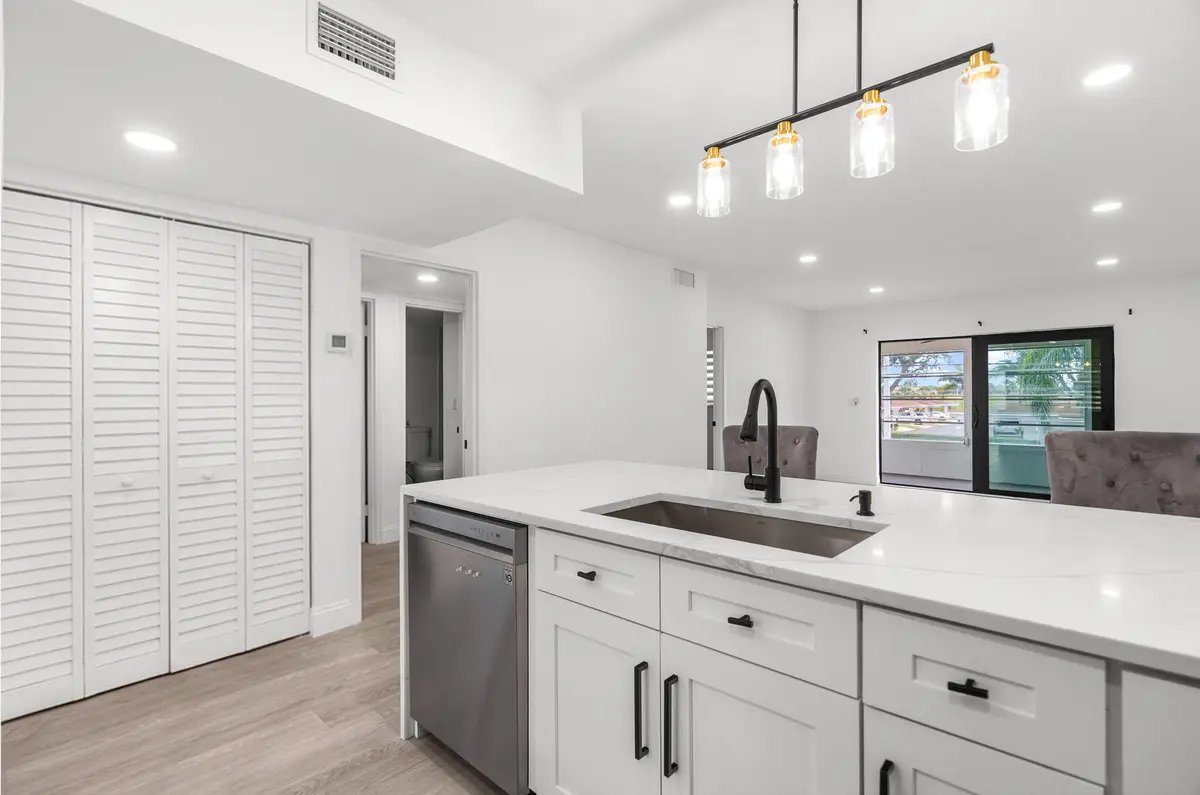 kitchen/ hallway closet at 5 Abbey Lane 207, Delray Beach