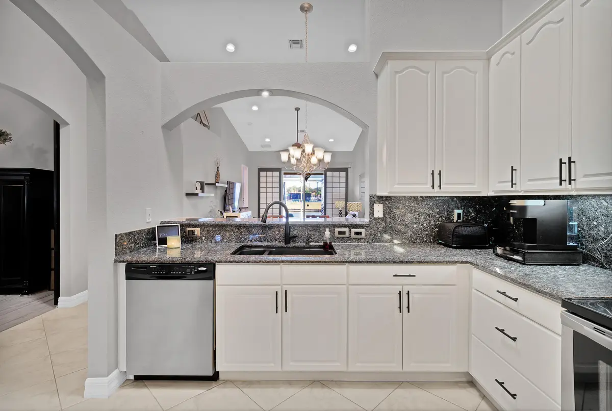 Kitchen with views of the lake at 6515 Oxford Circle 103, Vero Beach